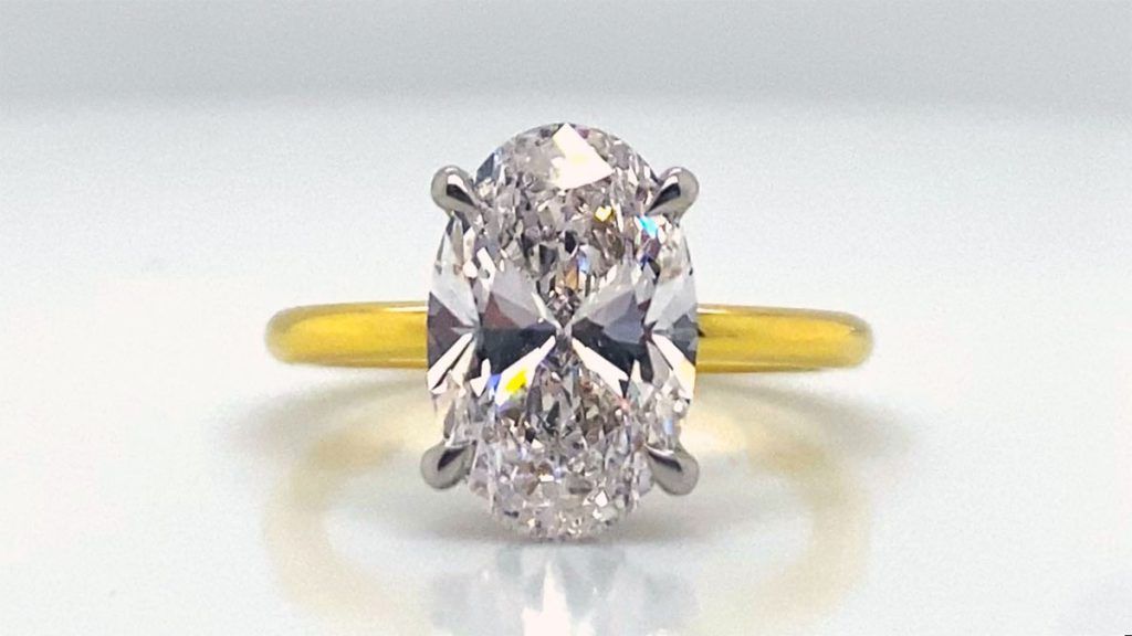 yellow gold oval diamond ring