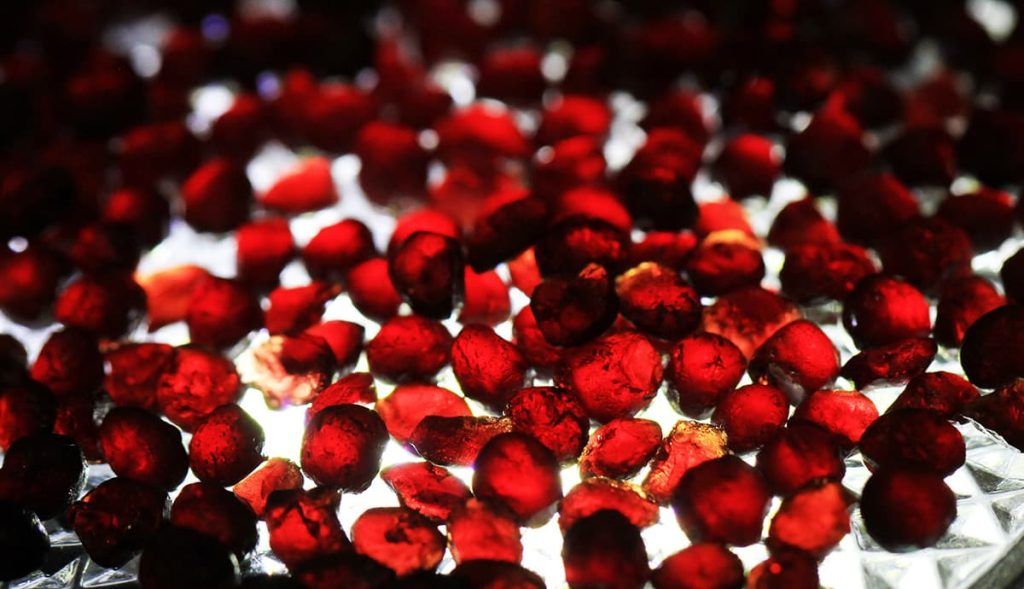 red gems on a light table